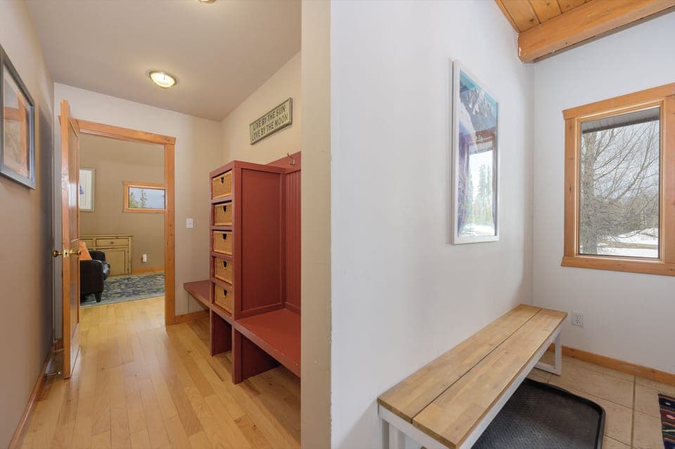 Step into your welcoming mudroom where you can settle in comfortably after mountain adventures.