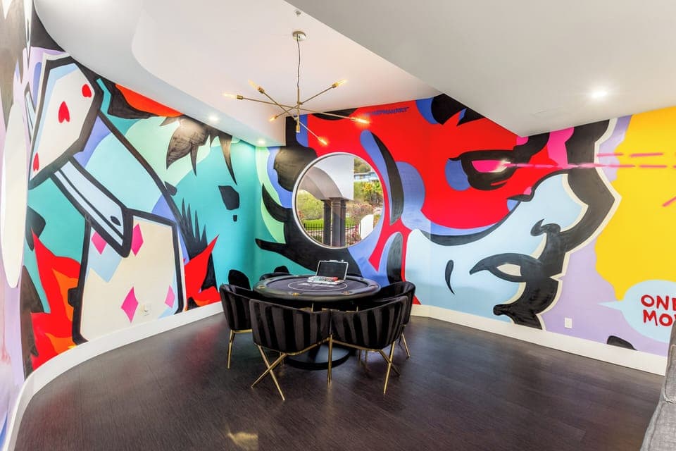 Game night just leveled up—art, energy, and comfort in every corner.