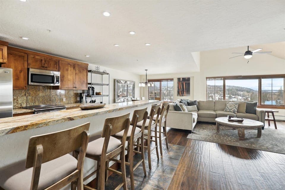 Main Living Space, Kitchen and Dining - TV, Gas Fireplace, Deck and Views