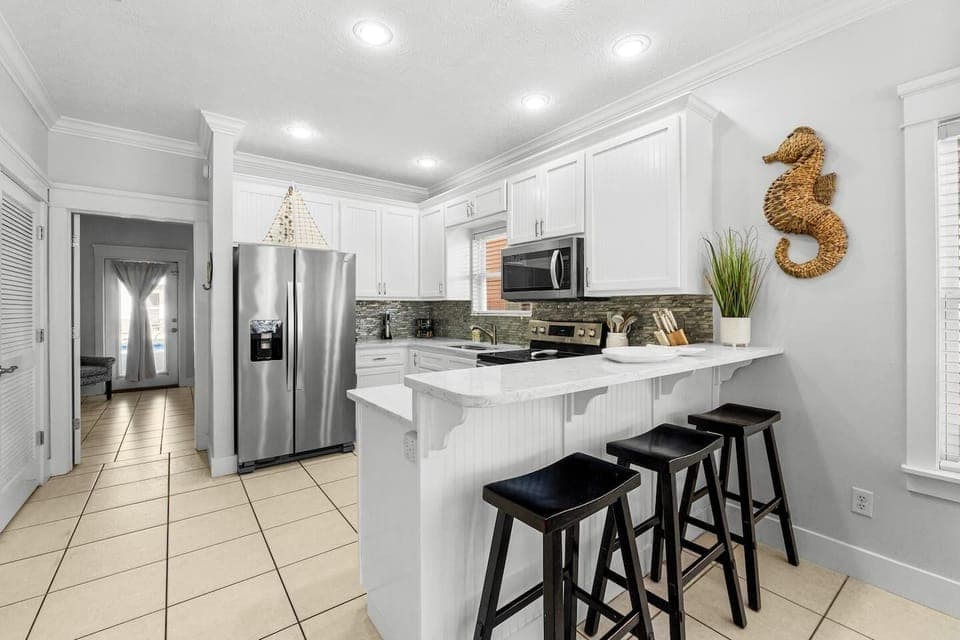 3 stools to use at the kitchen bar for more seating.