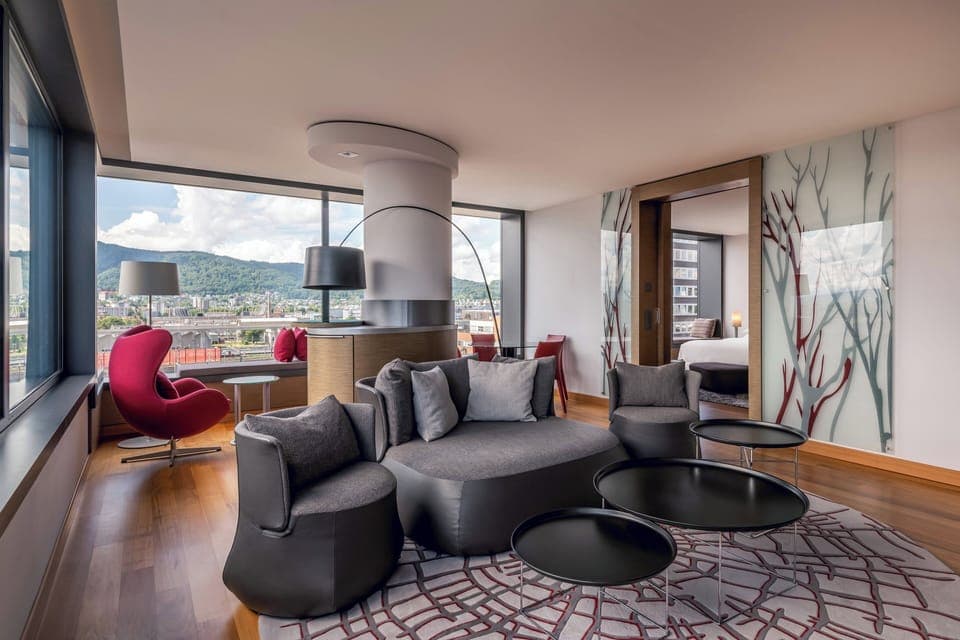 Executive Suite, 1 King Bed | Living room | 37-inch flat-screen TV with cable channels, TV