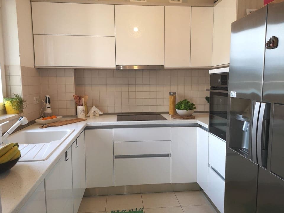 Apartment (Two Bedroom Apartment) | Private kitchen | Fridge, coffee/tea maker, highchair, dining tables