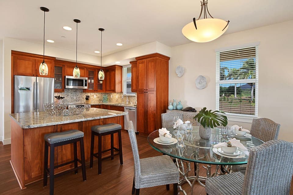 Gather for island-style meals in the open-concept dining space, perfectly designed for entertaining and connection.