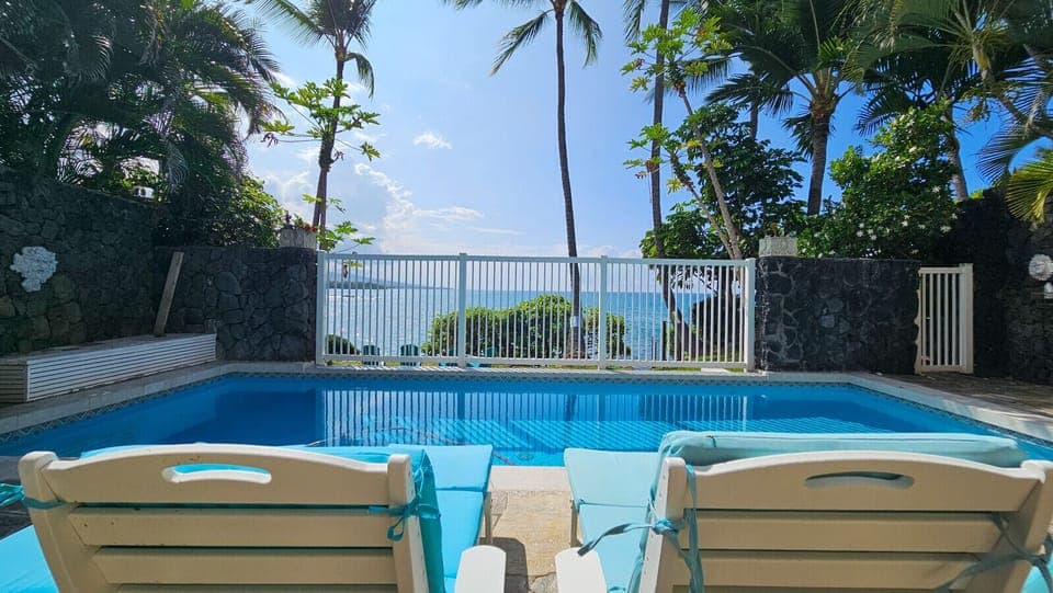 Private pool is backed by the ocean