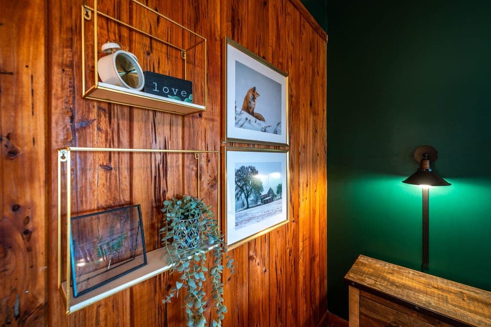 The Mountain Lodge bedroom-King bed; Main level, attached accessible bathroom.