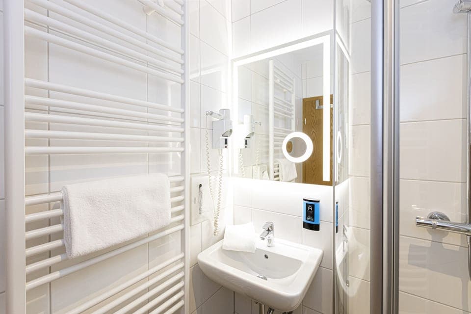 Shower, free toiletries, hair dryer, towels