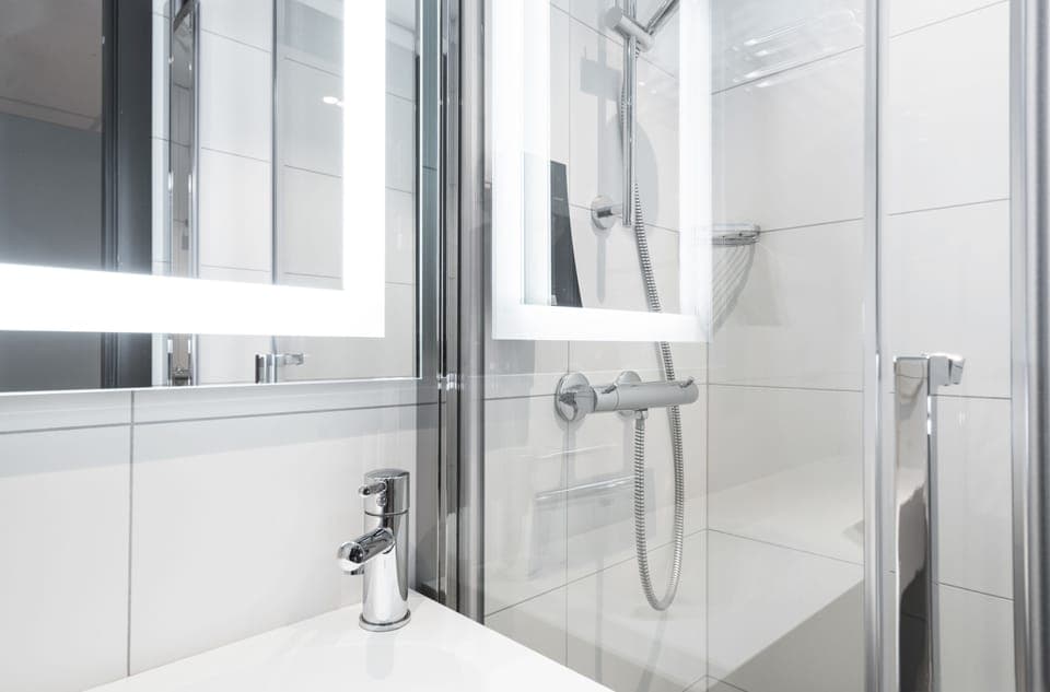 Shower, free toiletries, hair dryer, towels