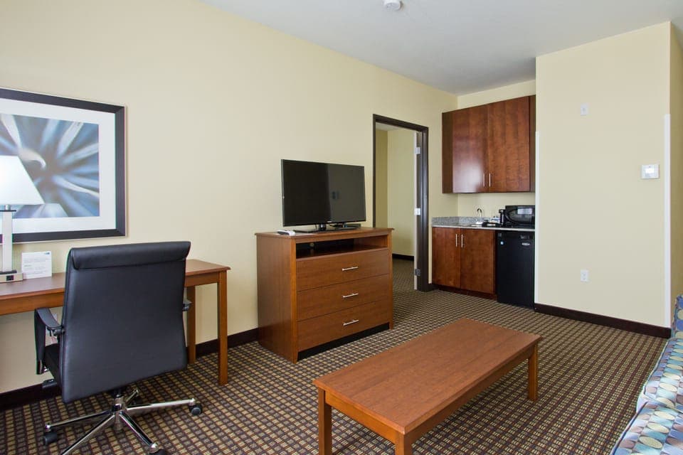 Desk, laptop workspace, blackout drapes, iron/ironing board