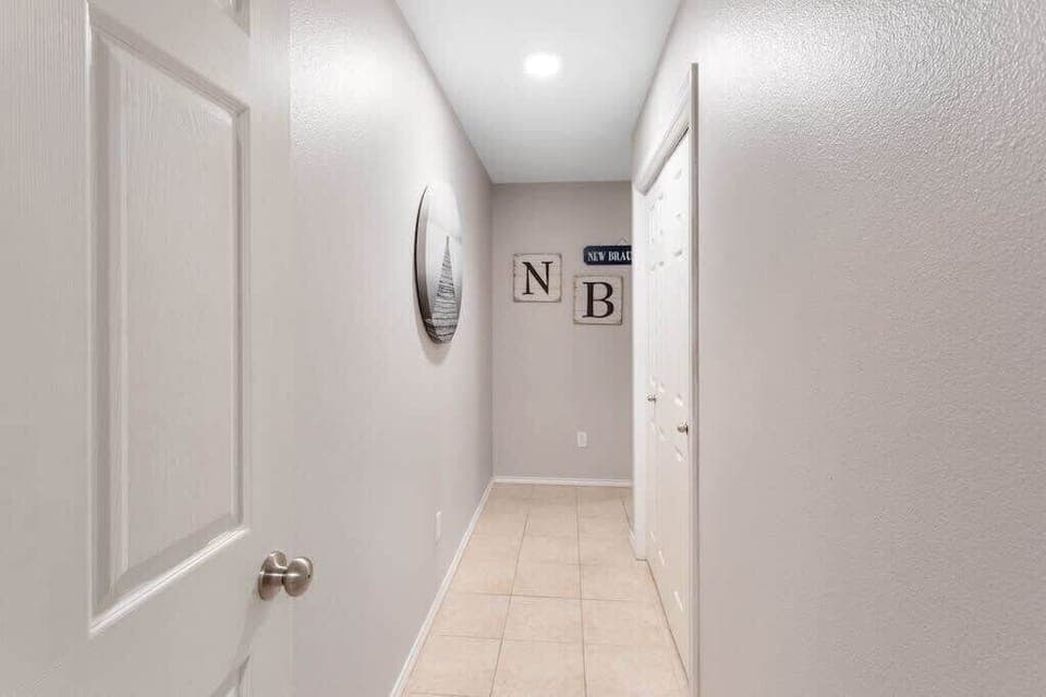 continued hall to back bedroom suite