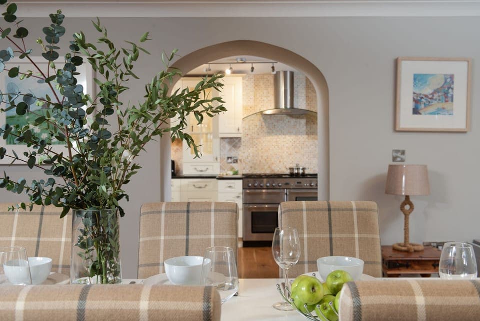 Large dining table leading onto the kitchen with large range cooker - 3 The Manor, Porthkidney Sands
