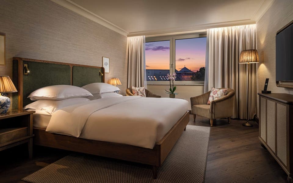 Hypo-allergenic bedding, free minibar, in-room safe, desk