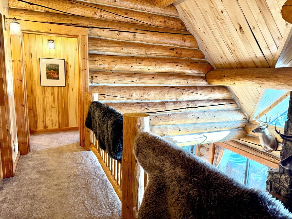 Top floor with bunk room on the right and bathroom on the left.