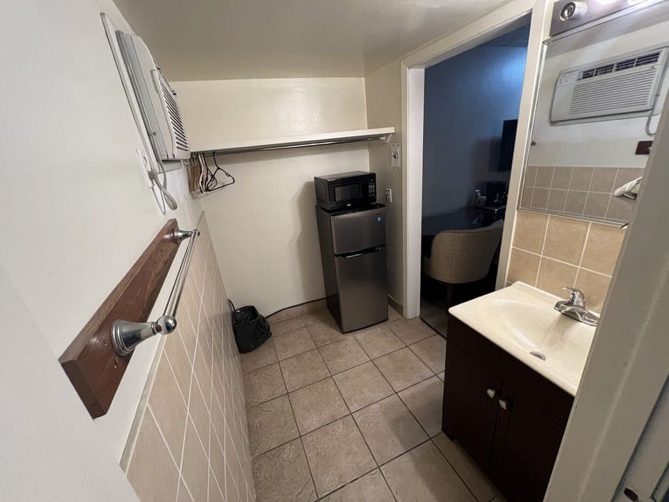 Deluxe Room, 1 King Bed | Bathroom | Hair dryer