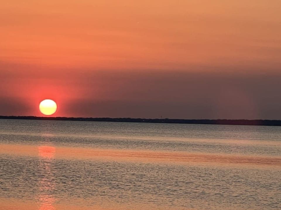 Experience the Sun Sets Over the Water