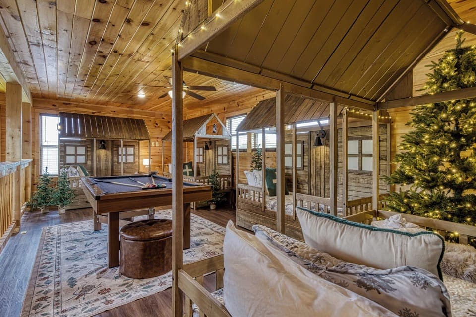 Mini cabin bunk room with 4 twin beds + 2 trundles—sleeps 6 in style!