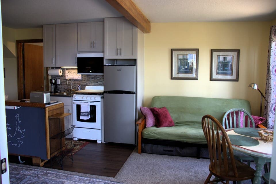 Cozy, light-filled interior with relaxing views in every season