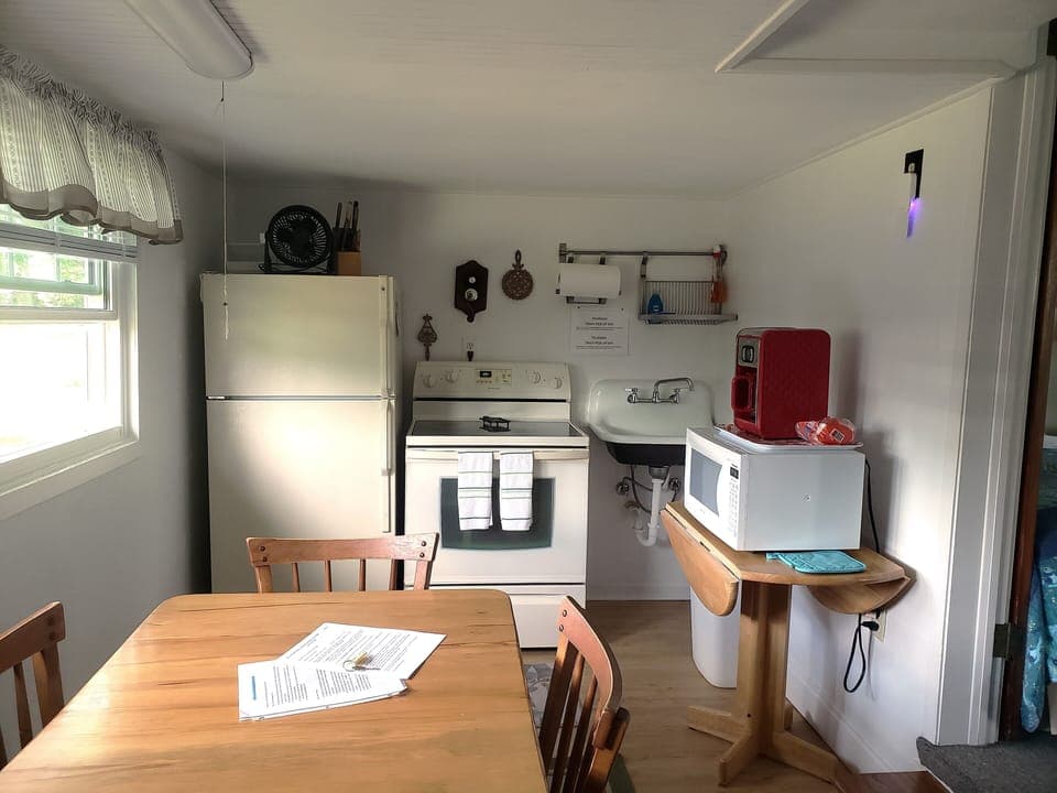 Full kitchen with electric range