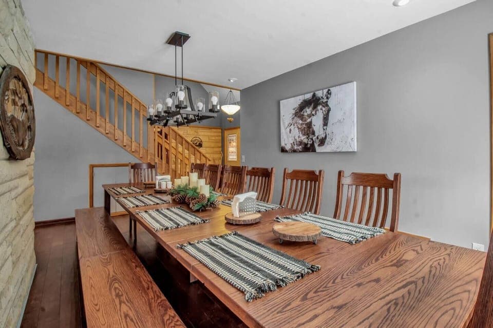 Dining room with 13' Amish made oak dining table and radiant floor heat