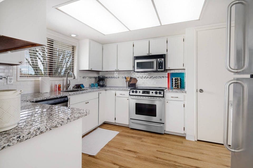 Your bright and beautiful fully stocked kitchen.