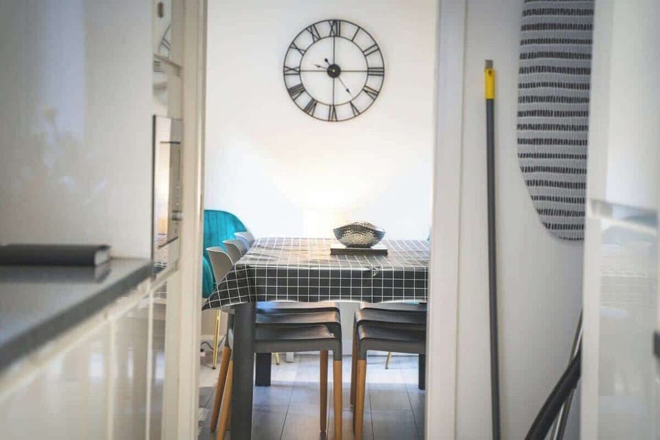 The dining room seats 6 people comfortably.