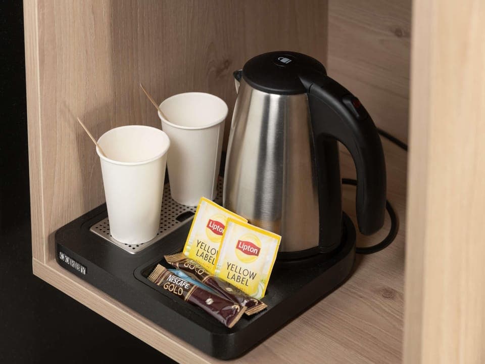 Comfort Room, 1 Double Bed, Balcony | In-room safe, desk, soundproofing, iron/ironing board