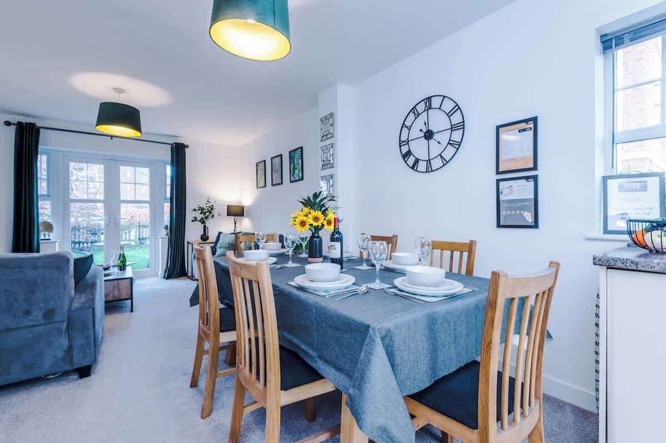 Open plan Dining area benefitting from a dining table that can seat up to 8 guests.