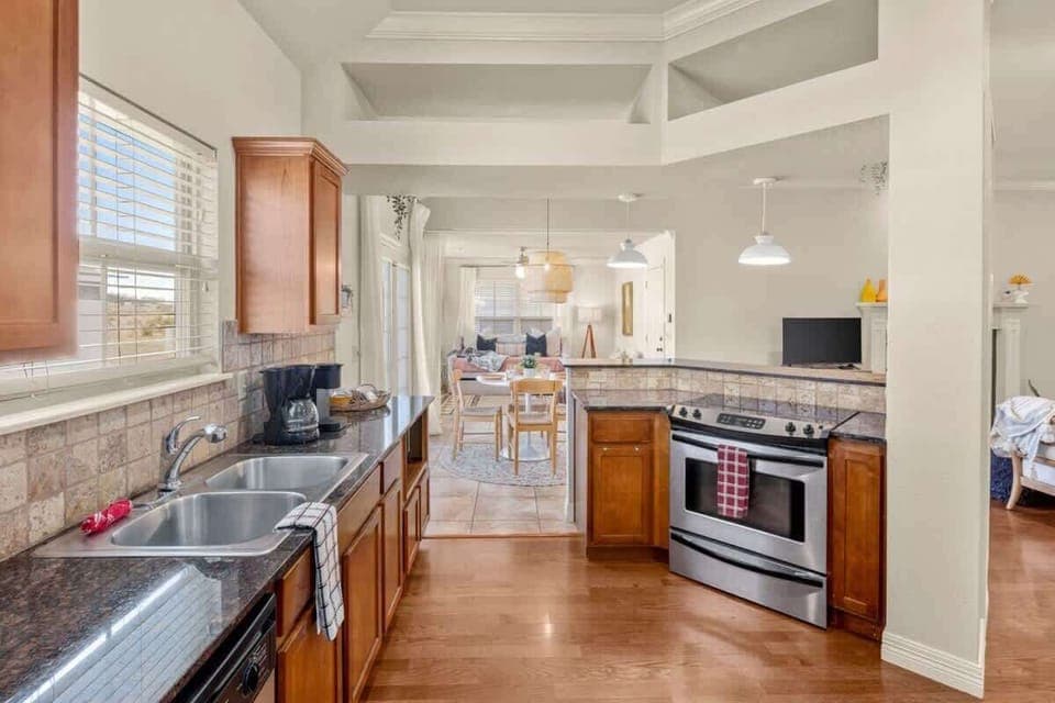 Fully equipped kitchen: Cook in style with stainless appliances, granite countertops, and everything you need