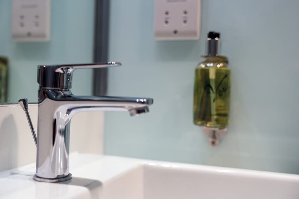 Shower, eco-friendly toiletries, hair dryer, towels