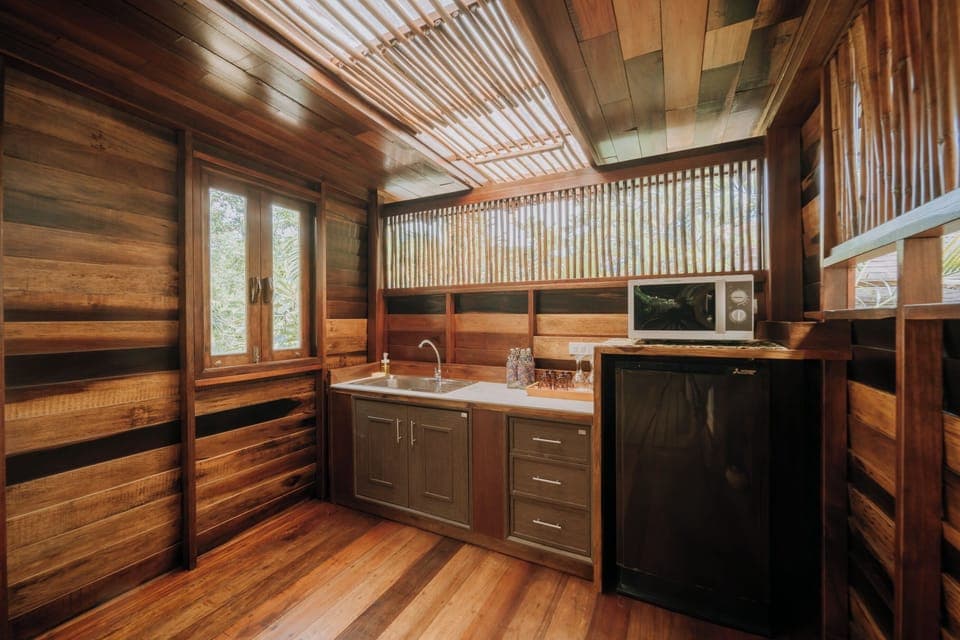 Family Cottage | Down comforters, minibar, in-room safe, individually decorated