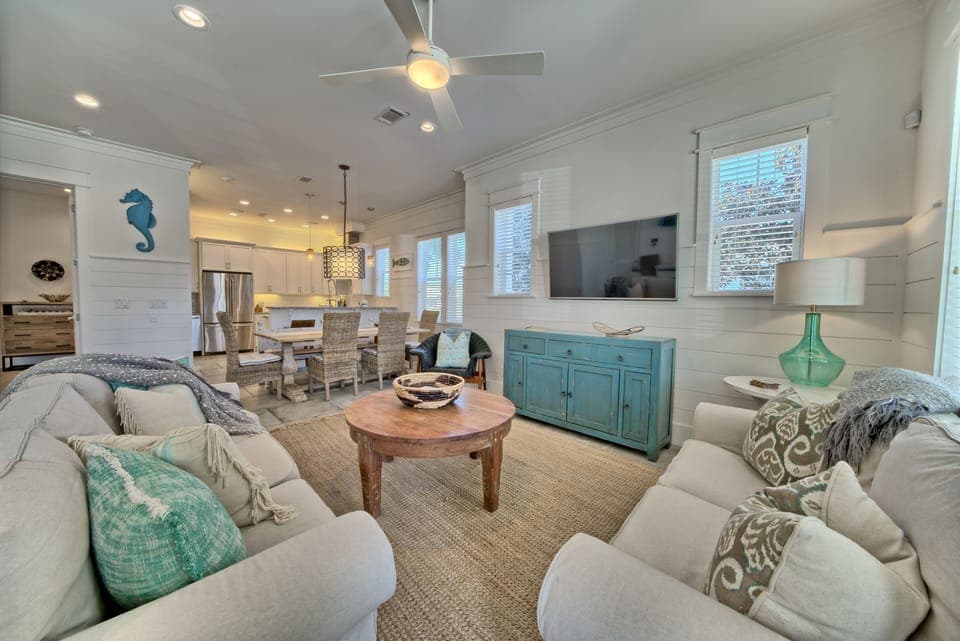 1ST FLOOR LIVING SPACE WITH VIEW OF THE CHEF'S KITCHEN