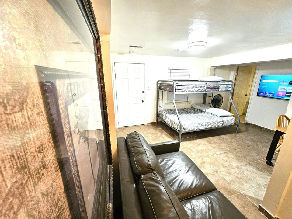 3rd Bedroom(ground floor):twin/full bunk bed, loveseat, 50" Smart TV
