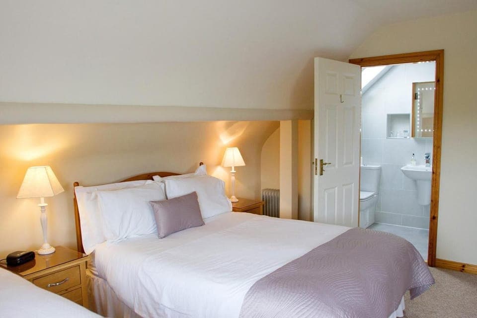 Select Comfort beds, blackout drapes, iron/ironing board, free WiFi