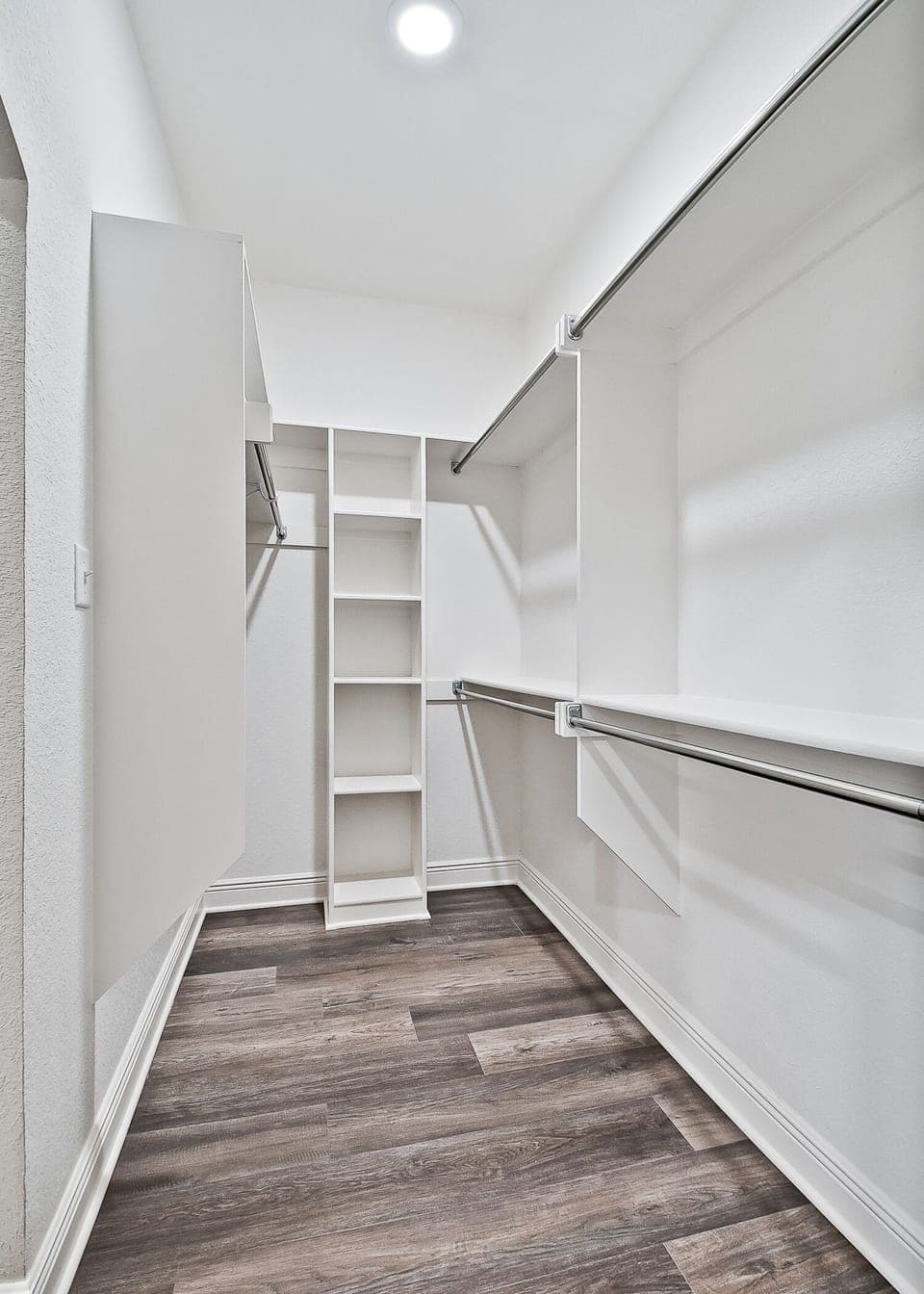 Closet in Main Bedroom that connects to laundry room