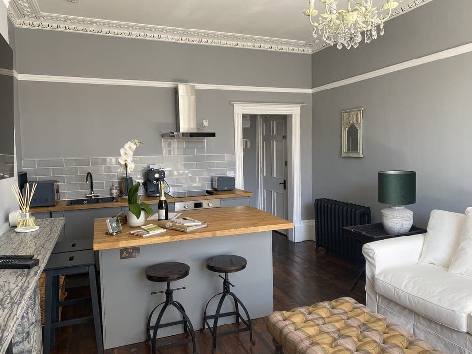 Living room with open plan kitchen