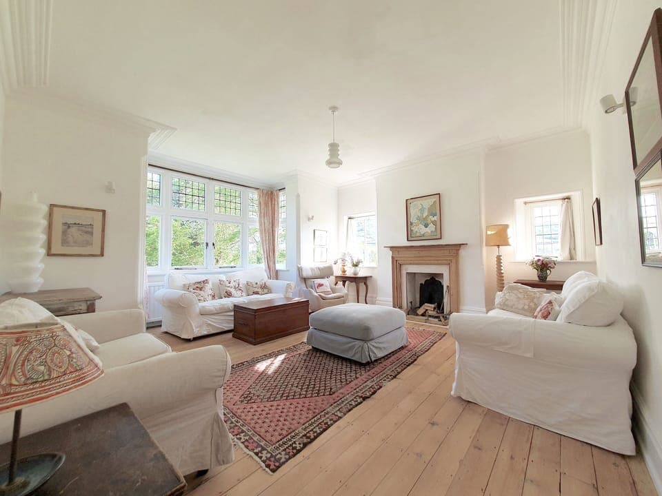 The sitting room at Rushay, with open fire and light on two sides