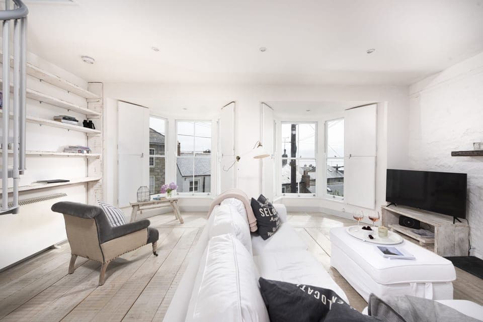 The living area with seating for all guests - Upper Chandlers