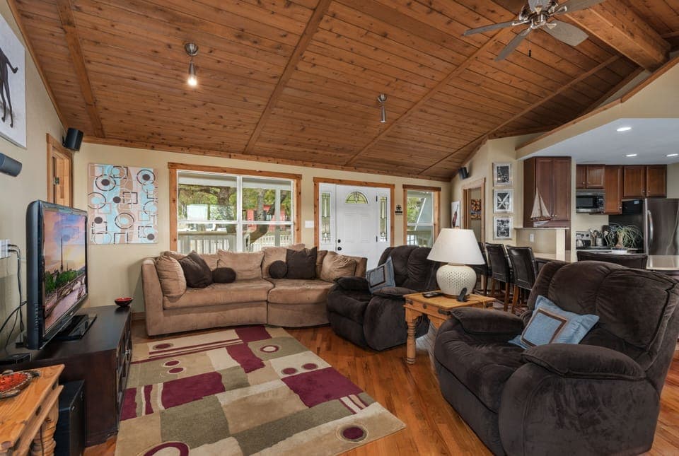 Main level TV Lounge. Massive comfy couch and reclining chairs. Movie time! 