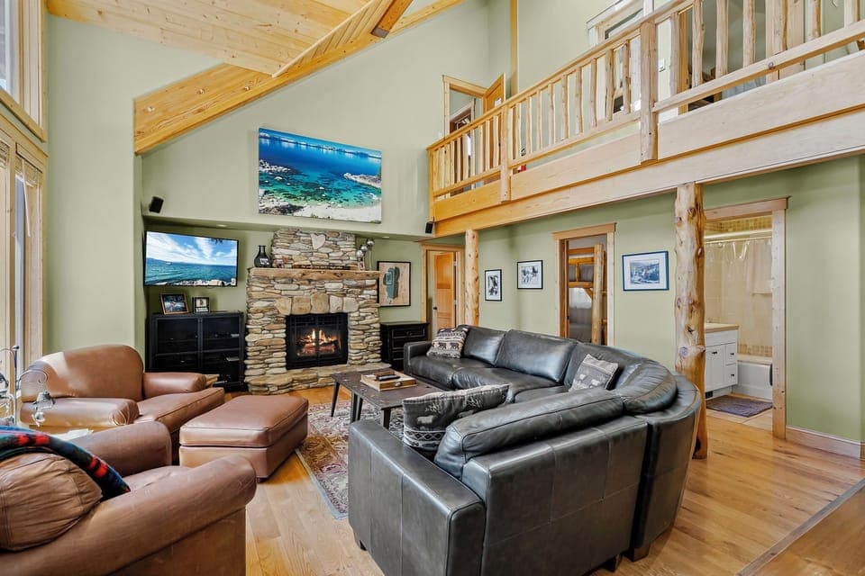 Cozy up to a natural rock framed gas fireplace