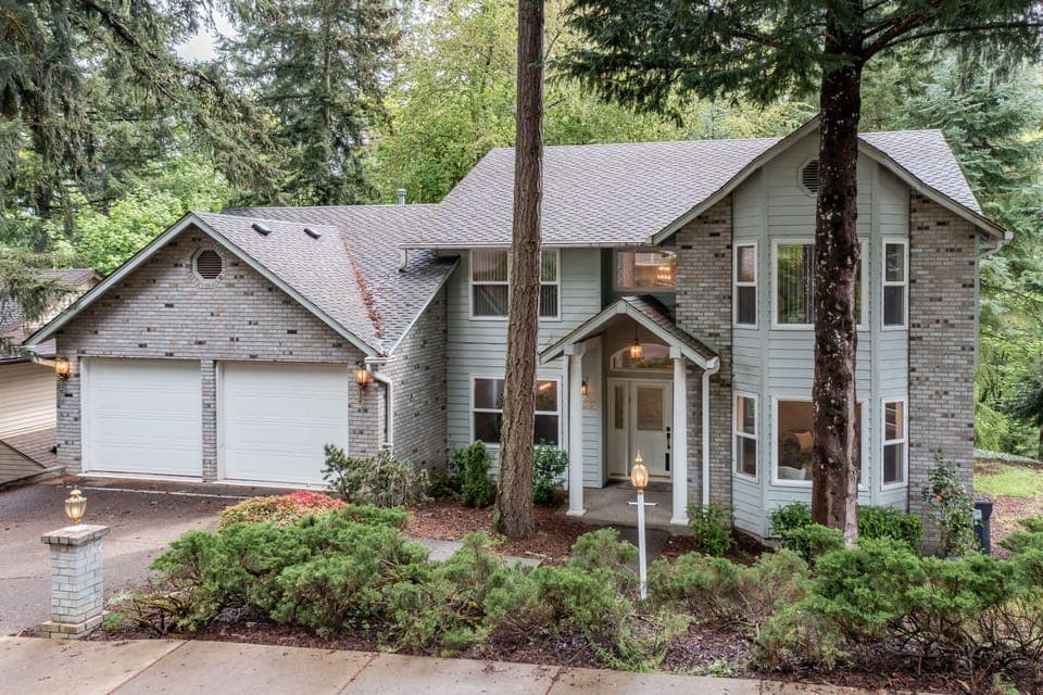 Main house with front entrance and driveway