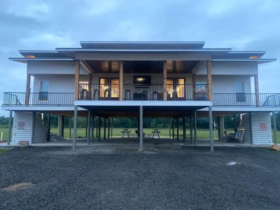 Exterior of OTR 
Both sets of double doors have riverview front porch 