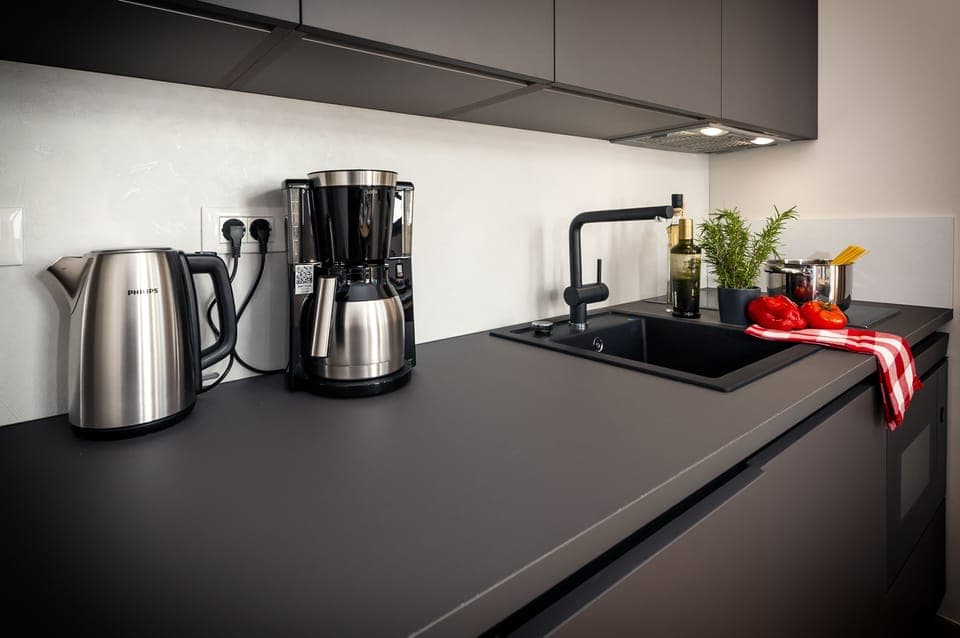 Deluxe Apartment, 1 Bedroom | Private kitchen | Coffee/tea maker, electric kettle