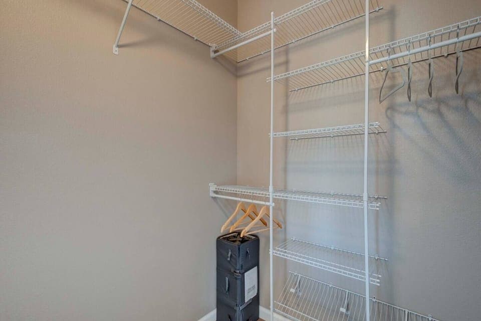 Walk-in closet for bedroom 1. A pack n play is also available