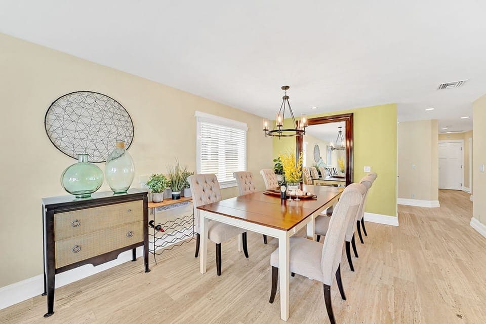 The dining table includes seating for 6-8.
                