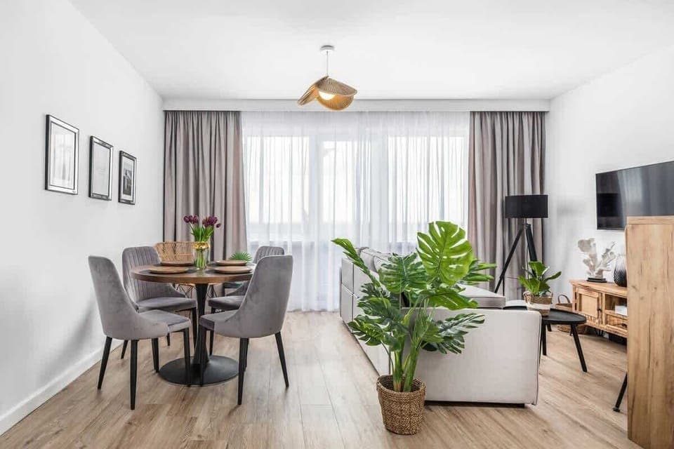 Living room with a comfortable sofa and TV. 