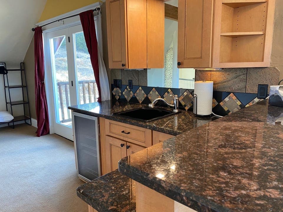 1st bedroom- king suite with wet barand gas fireplace