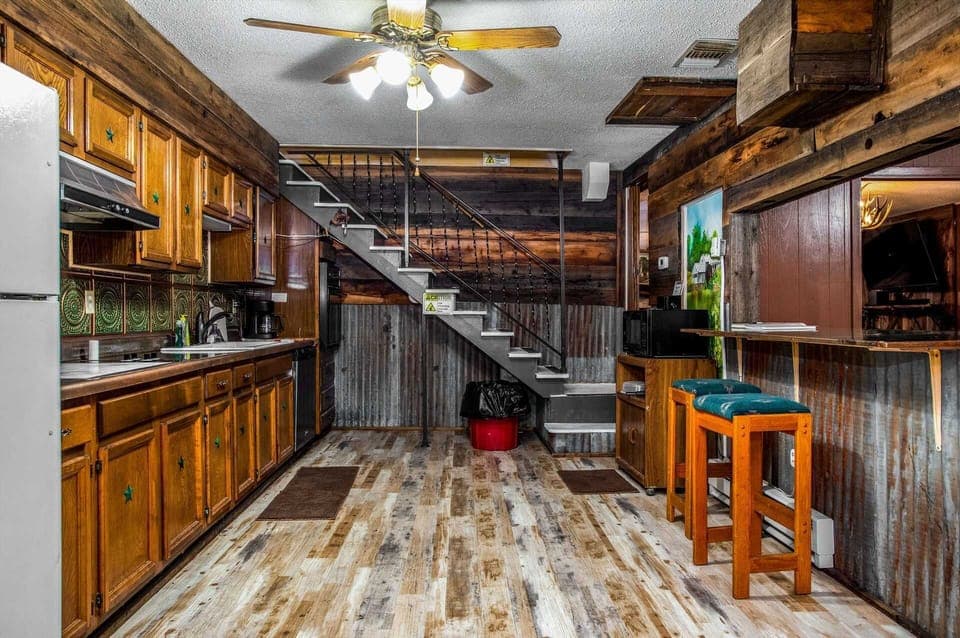 The combination of modern and nostalgic craftsmanship creates an atmosphere that's both spacious and cozy.