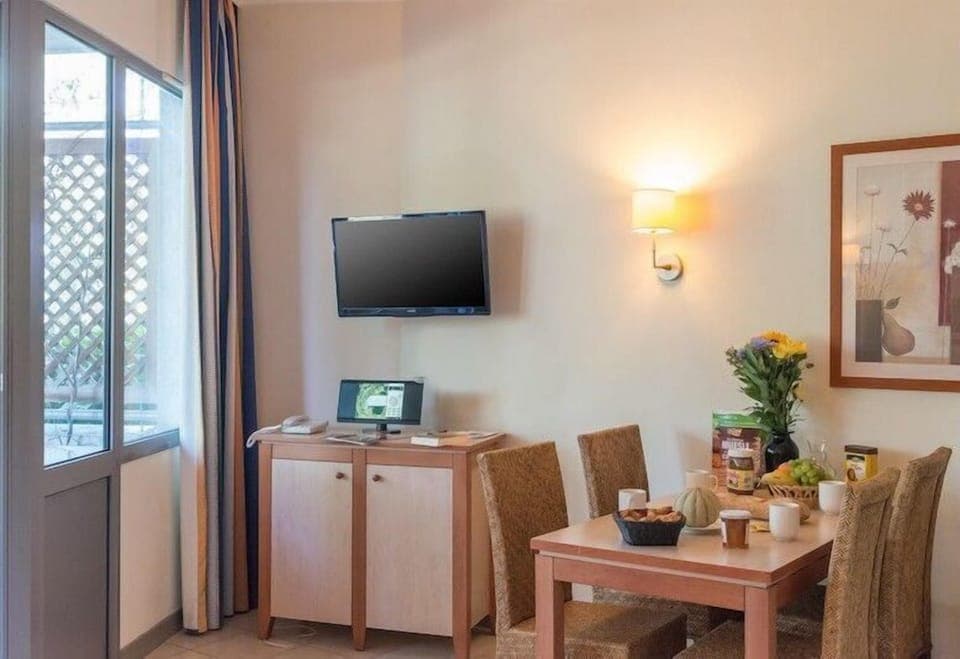 Kick back and watch a show on the TV.