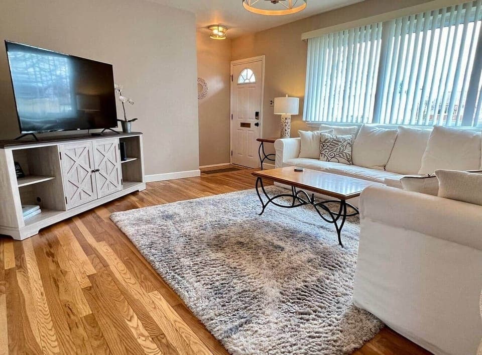 Sun drenched, first floor living room with plenty of seating