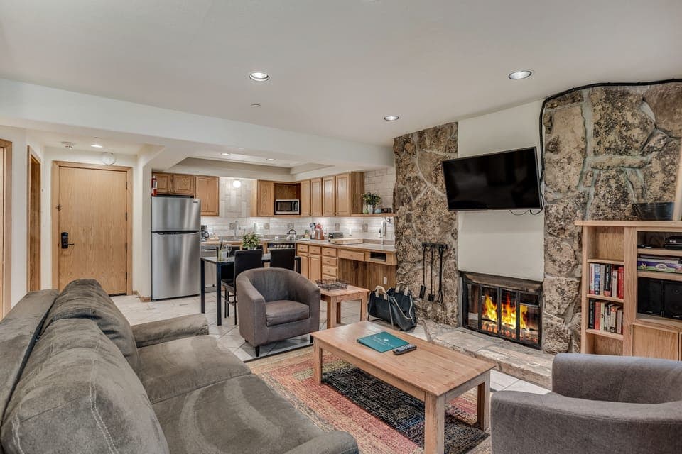 Living area with wood-burning fireplace