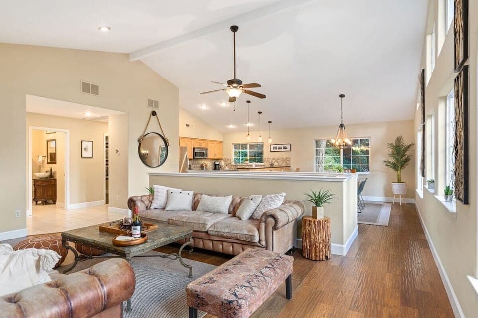 An open concept living room, dining room, and kitchen sets a perfect place to host your friends and family for a much needed getaway. Savor the flavors of a local Sonoma County wine and unwind in this luxurious space.